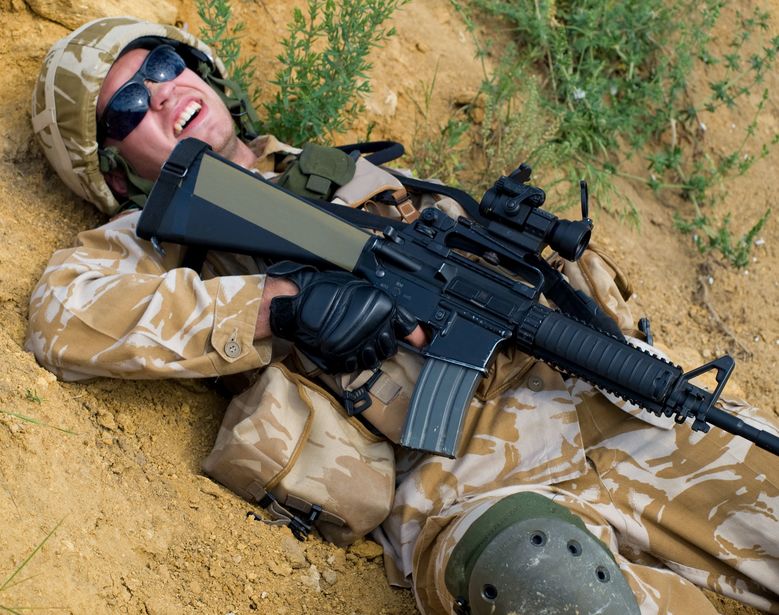5183125 - british soldier in desert uniform lying wounded 5183125 - british soldier in desert uniform lying wounded